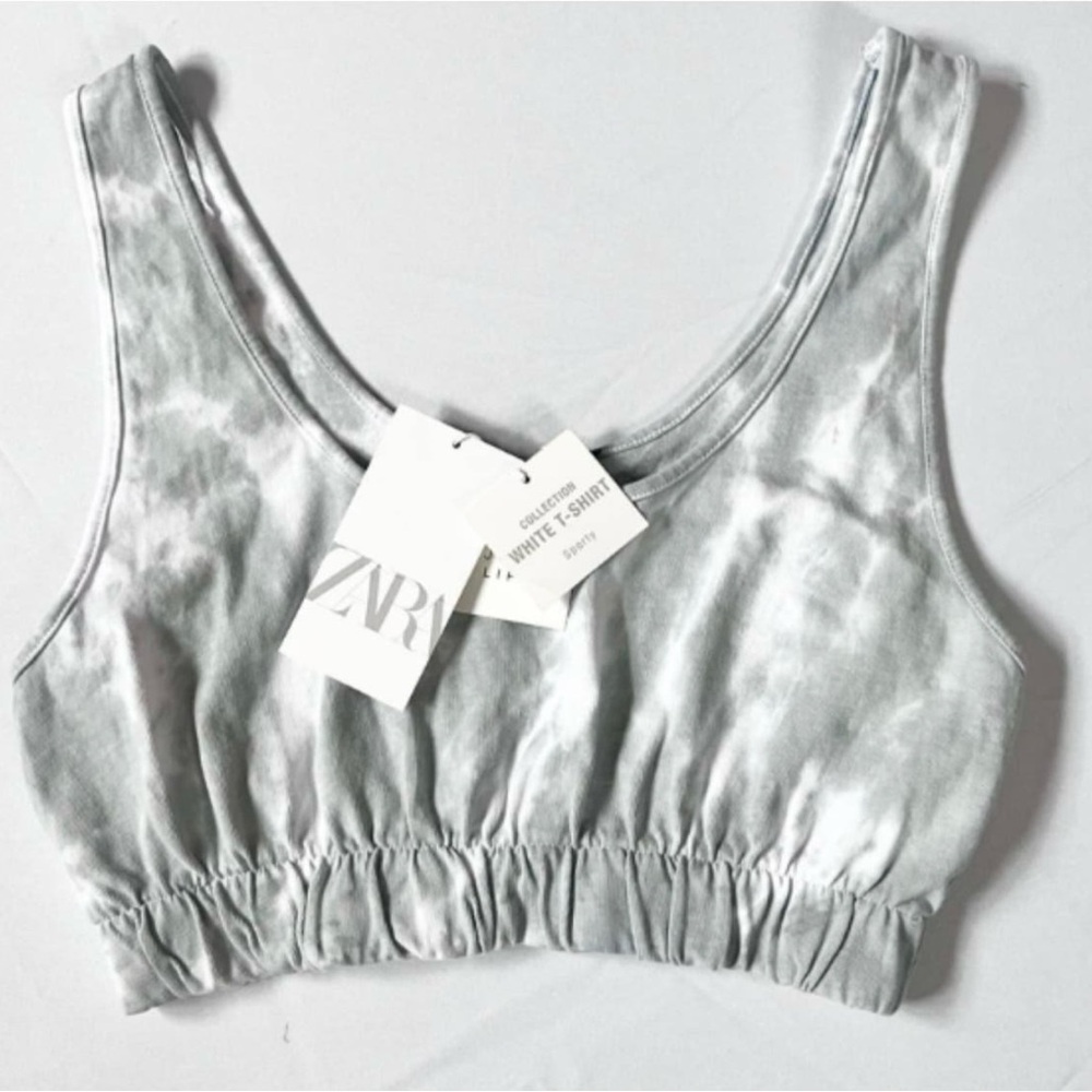 Sage/Grey white colors. Subtle tie-dye style with nice stretch. 100% Cotton.